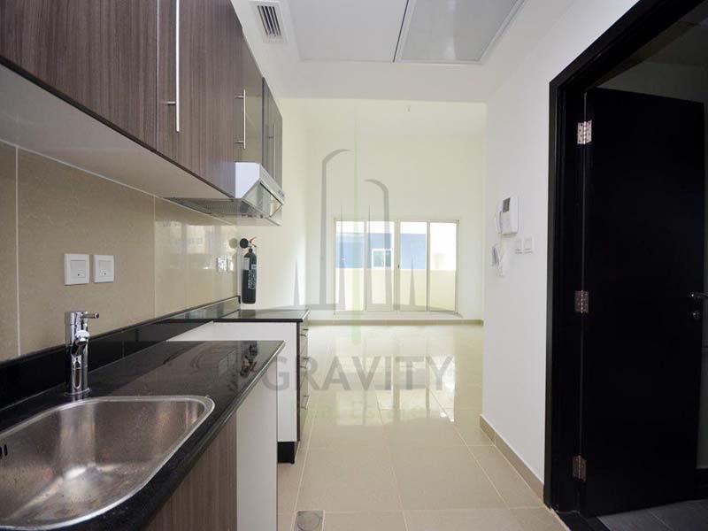 spacious-studio-place-and-open-kitchen-area-in-front-of-the-washroom-al-reef-downtown