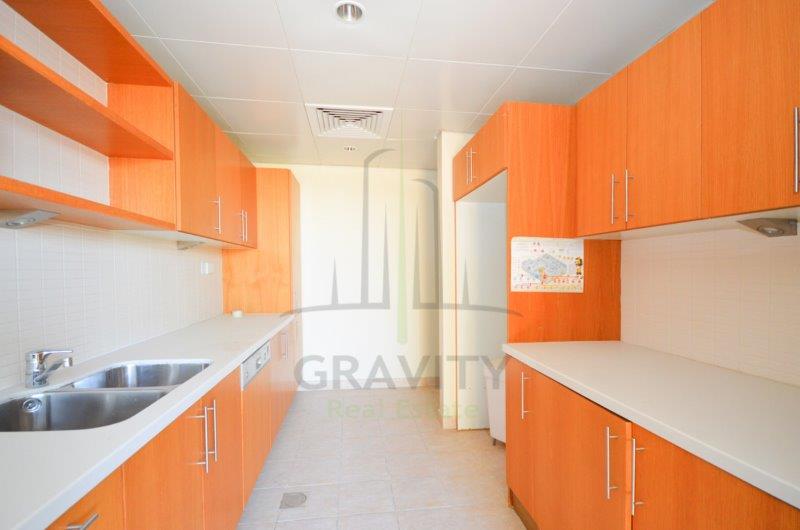 stunning-fully-fitted-kitchen-of-a-3-bedroom-townhouse-in-al-mariah-community-raha-gardens-for-rent