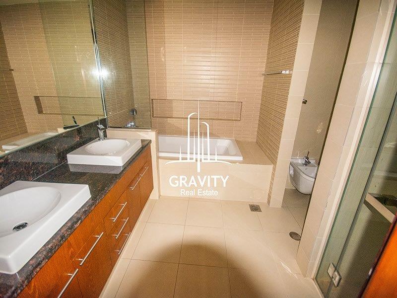 well-maintained-bathroom-w-2-sinks-bathtub-own-toilet-room-of-a-2bedroom-apartment-in-saadiyat-island-beach-residence