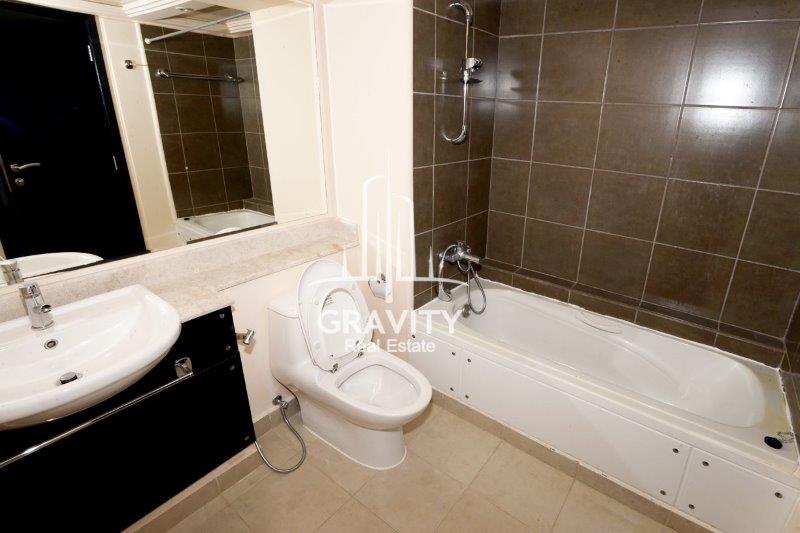 well-maintained-bathroom-w-bathtub-of-a-5-bedroom-villa-in-al-reef-dessert-village-for-rent