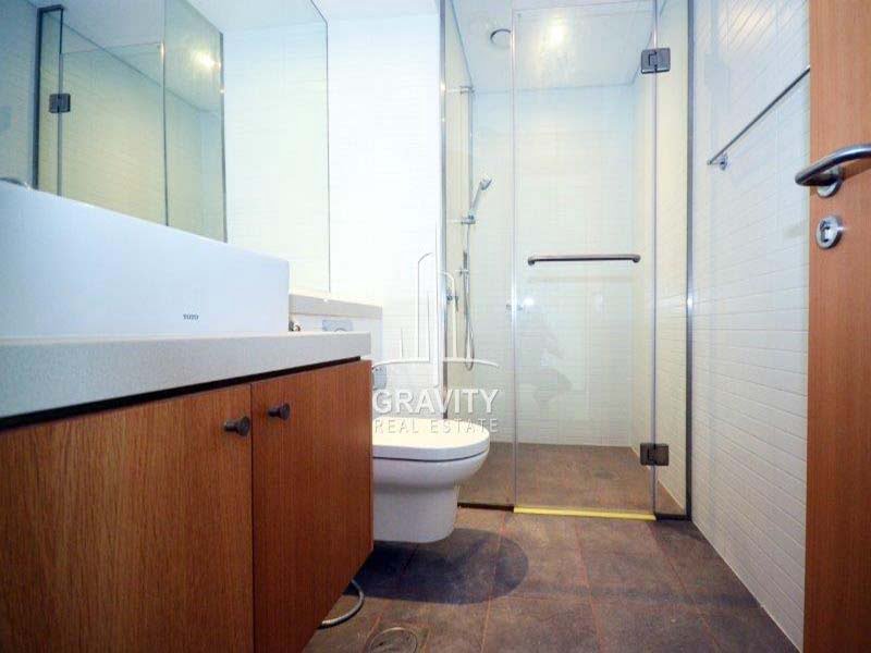 well-maintained-bathroom-w-vanity-mirror--of-a-2-bedroom-apartment-in-al-rahba-al-muneera