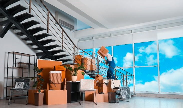 affordable-movers-team-moving-boxes-up-a-duplexes-stairwell