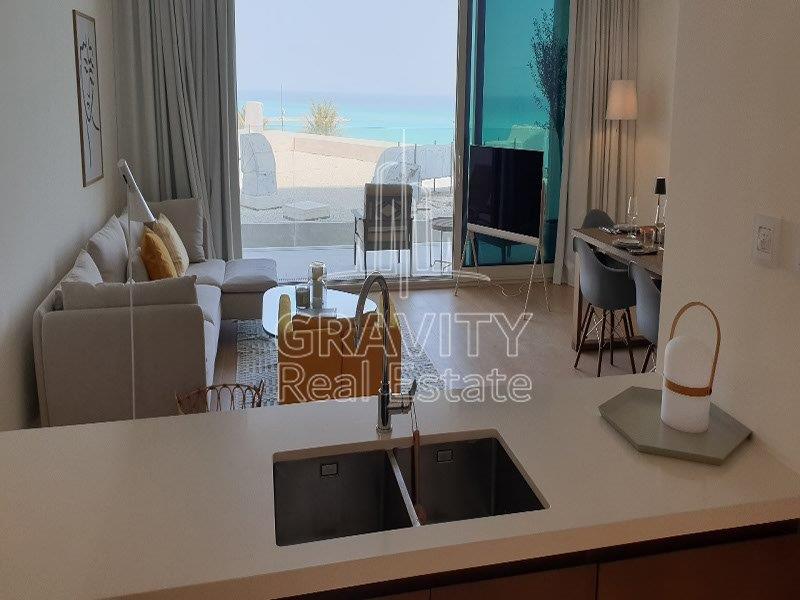 amazing-living-hall-area-with-open-kitchen-and-amazing-view-of-the-sea-from-hall-mamsha-al-saadiyat