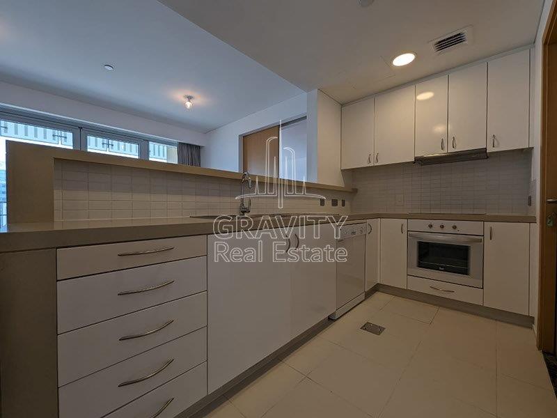 fully-fitted-kitchen-w-amazing-finishes-and-cabinets-of-a-1-bedroom-apartment-in-al-sana-1-al-muneera-al-raha-beach