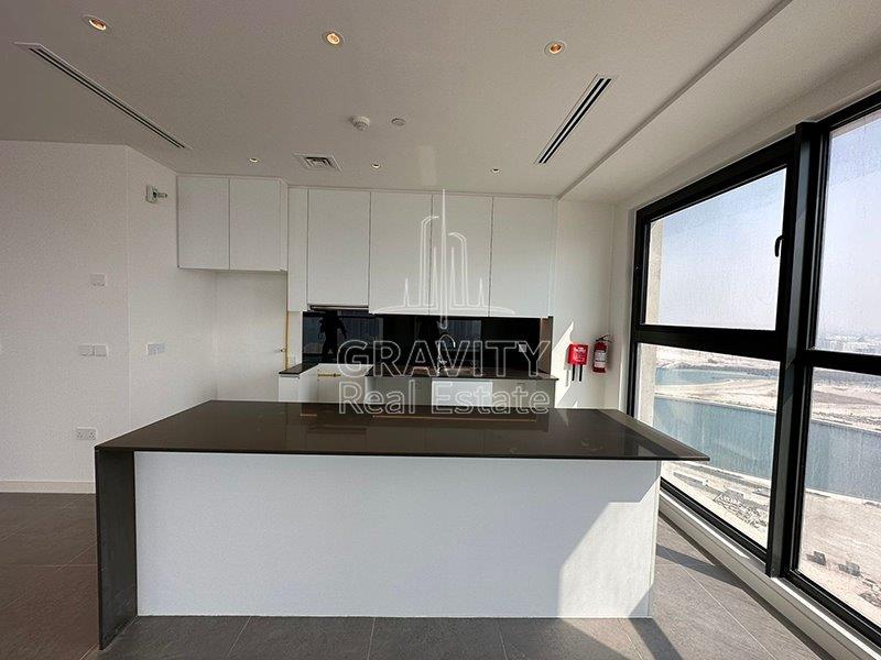 open-kitchen-of-a-2-bedroom-apartment-in-pixels-reem-island-for-sale