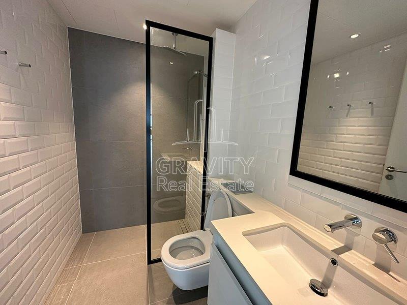 well-maintained-bathroom-of-a-2-bedroom-apartment-in-pixels-reem-island-for-sale