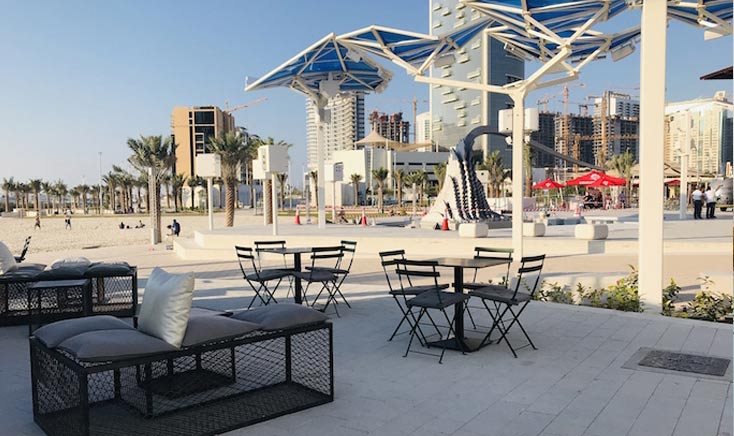 reem-central-park-F&B-sitting-area-near-beach-with-mechanical-shades