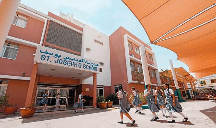 entrance-of-st-josephs-school-with-young-school-girls-making-their-way-in