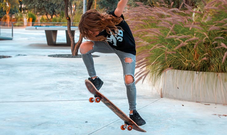 skater-girl-doing-an-olie-in-al-fay-park-in-reem-island