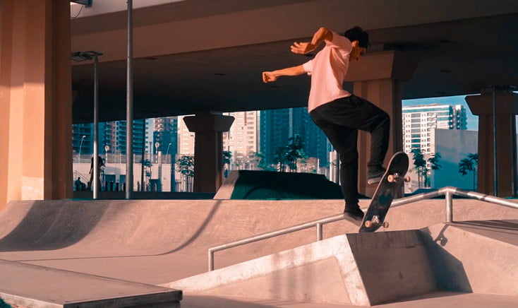 teenager-skating-on-a-ramp-in-reem-central-park-near-sunset-time