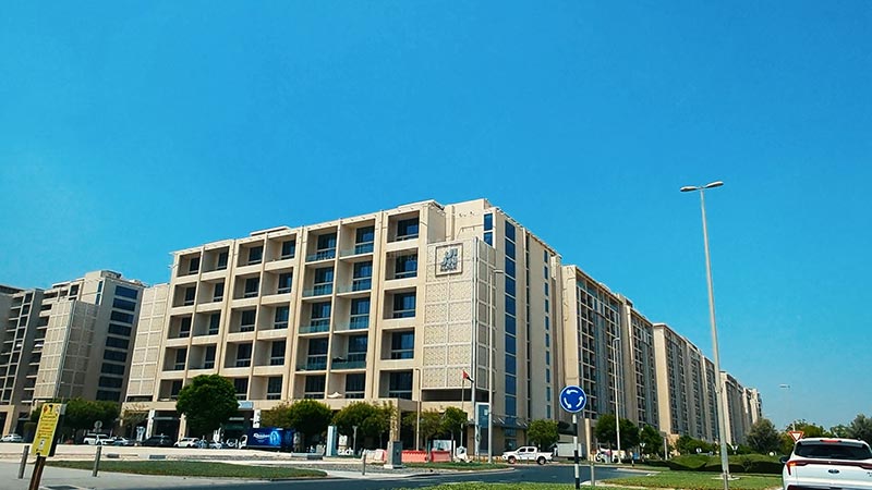 Al Zeina buildings view from afar across the street