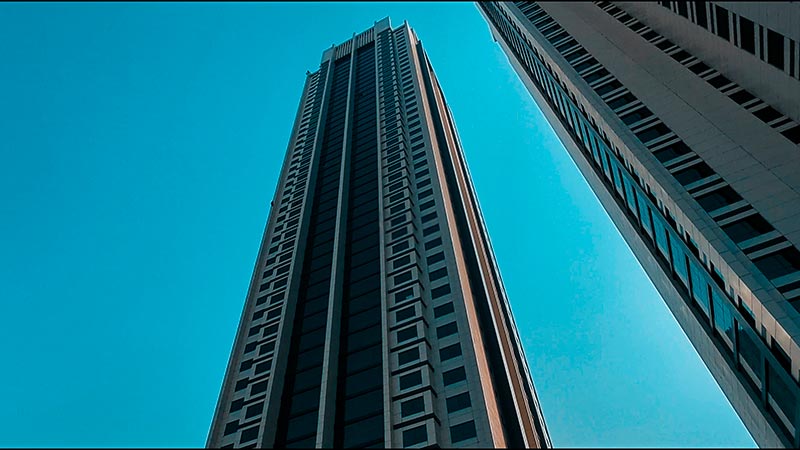 ground level looking above marina blue tower reem island