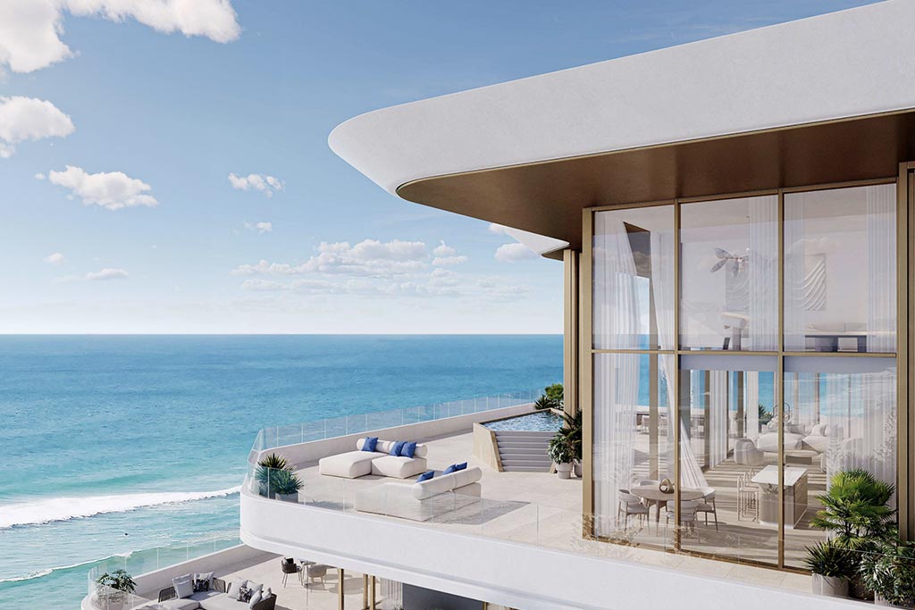 Nikki Beach residences sky terrace with an indoor pool overlooking the beach