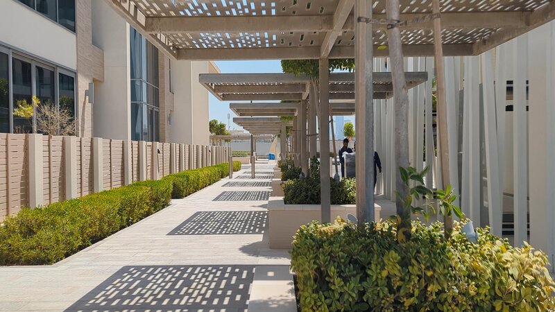 shaded pathway outside Mamsha Al Saadiyat