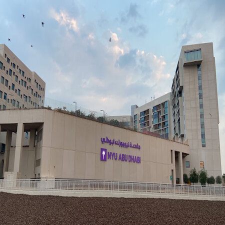 NYU Abu Dhabi logo outside the building